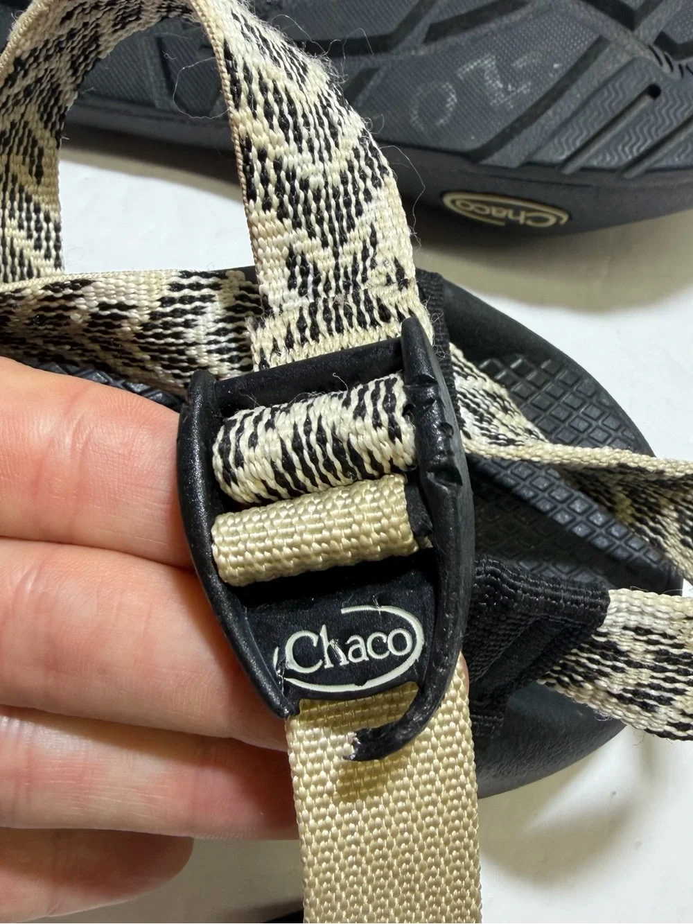 Chaco Black Sandal with Tan and Beige Chevron Straps 7 small chip in clasp